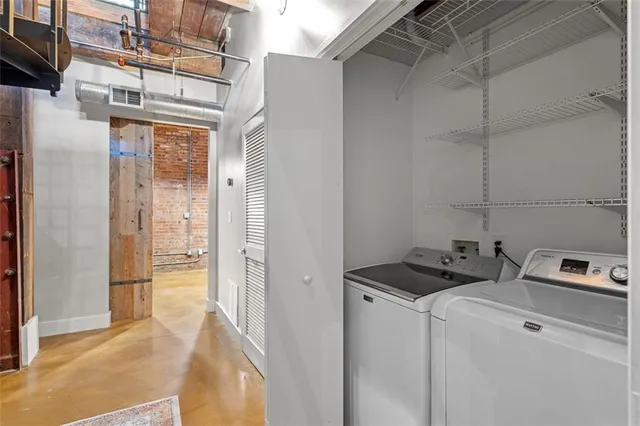 a view of balcony with furniture