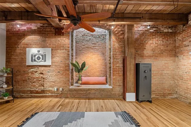 a backyard of a house with sofas