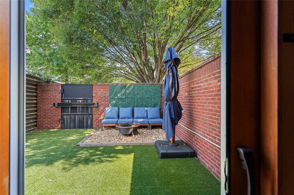 490 Marietta Street Northwest, Unit 101 Atlanta, GA 30313 - Photo 53 of 102 a front view of a house with garden