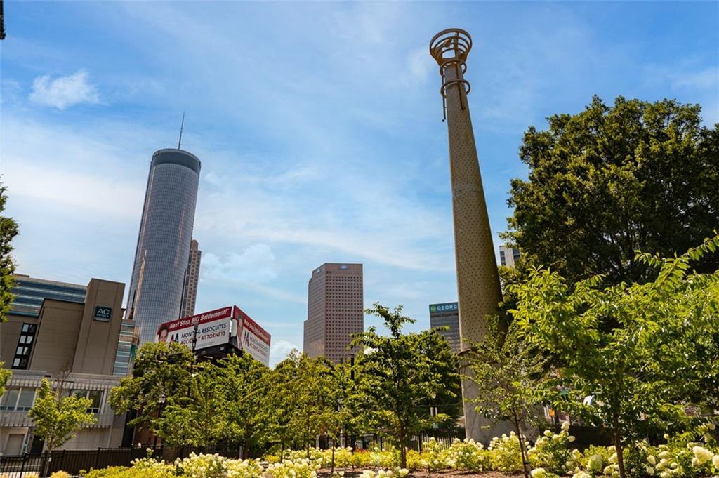 490 Marietta Street Northwest, Unit 101 Atlanta, GA 30313 - Photo 75 of 102 a front view of a house with a yard
