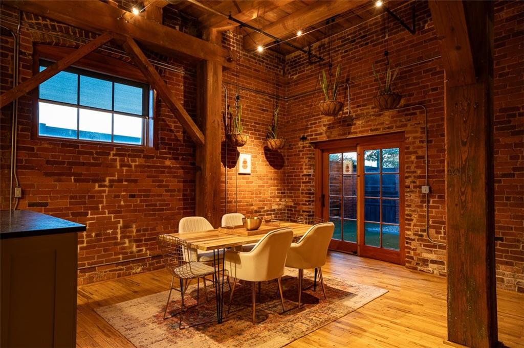 490 Marietta Street Northwest, Unit 101 Atlanta, GA 30313 - Photo 83 of 102 a patio with table and chairs