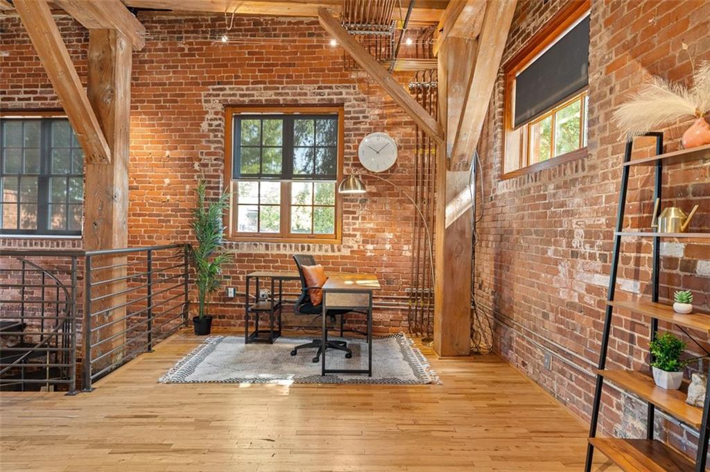 490 Marietta Street Northwest, Unit 101 Atlanta, GA 30313 - Photo 10 of 102 a view of a brick building with many windows