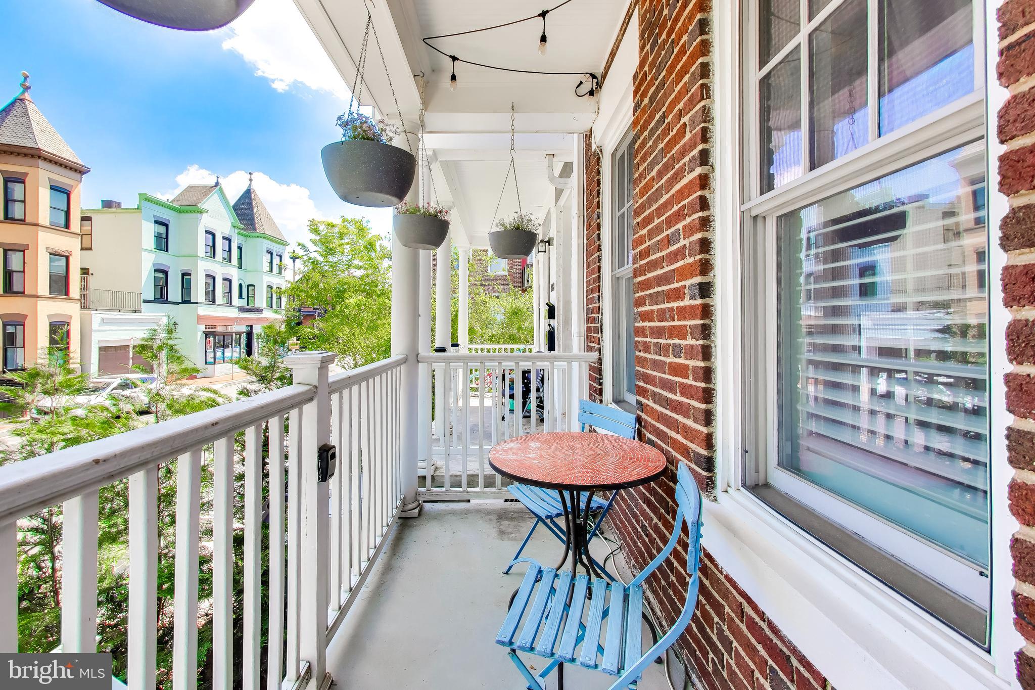1910 4th Street Northwest Washington, DC 20001 - Photo 2 of 20 a view of a chair and table in the balcony