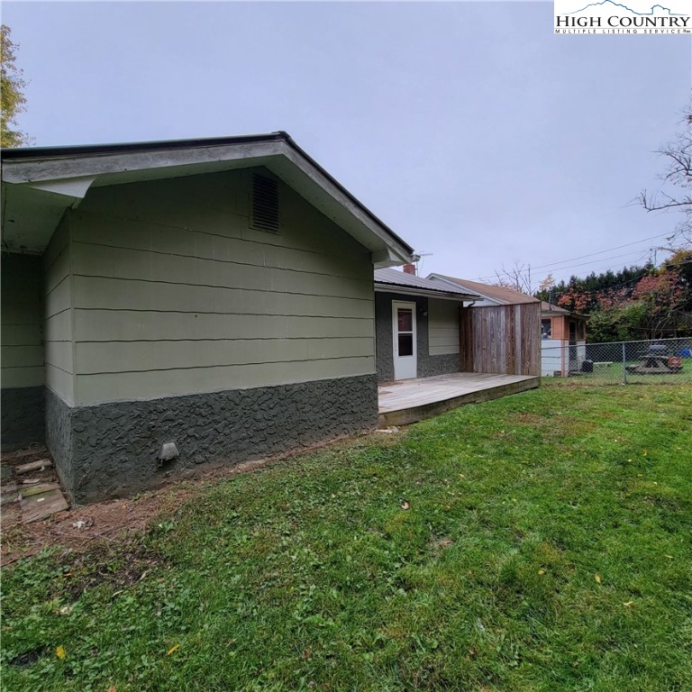 151 Rogers Drive Boone, NC 28607 - Photo 15 of 15 a backyard of a house with lots of green space