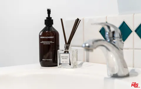 a view of a bedroom with washer and dryer