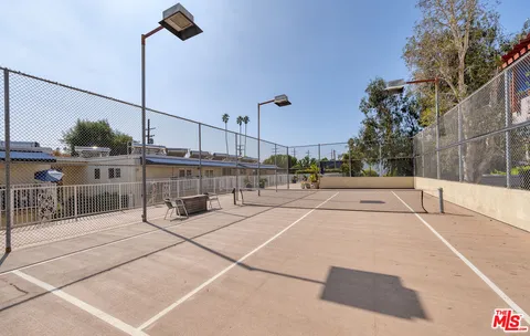 a view of balcony with furniture