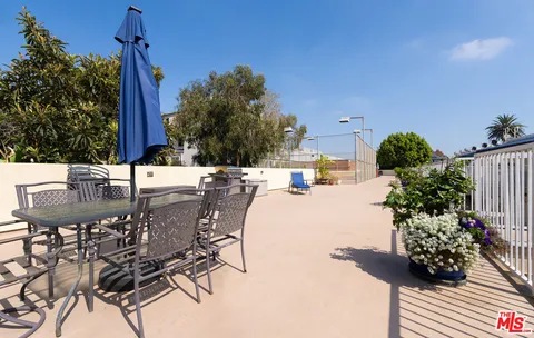 a view of a street with trees