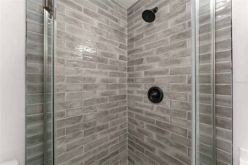 2203 Nottingham Road South Daytona, FL 32119 - Photo 26 of 40 a bathroom with a shower