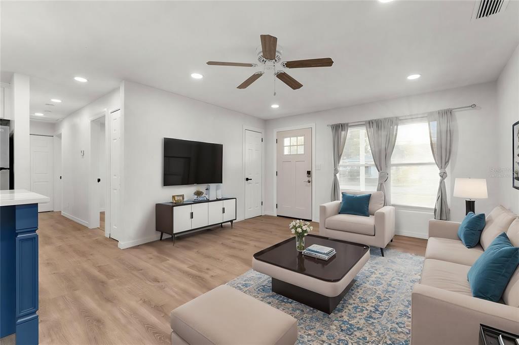 2203 Nottingham Road South Daytona, FL 32119 - Photo 3 of 40 a living room with furniture and a flat screen tv