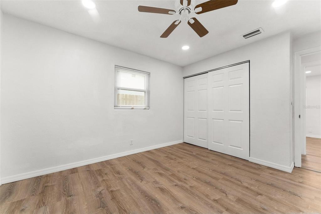 2203 Nottingham Road South Daytona, FL 32119 - Photo 35 of 40 wooden floor in an empty room