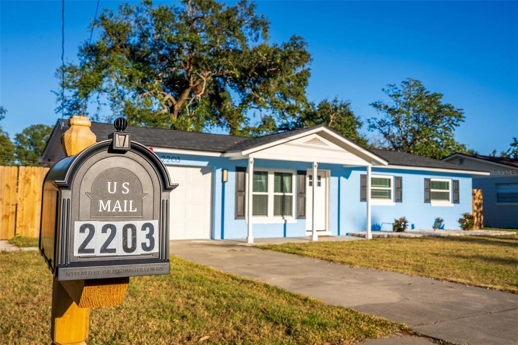 2203 Nottingham Road South Daytona, FL 32119 - Photo 36 of 40 front view of a house with a sign board