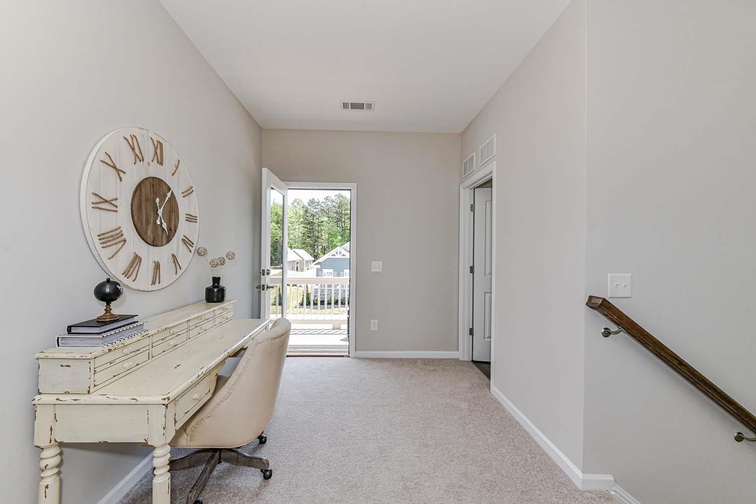 277 Harrison Lane Locust, NC 28097 - Photo 12 of 25 a view of a hallway to a livingroom with furniture