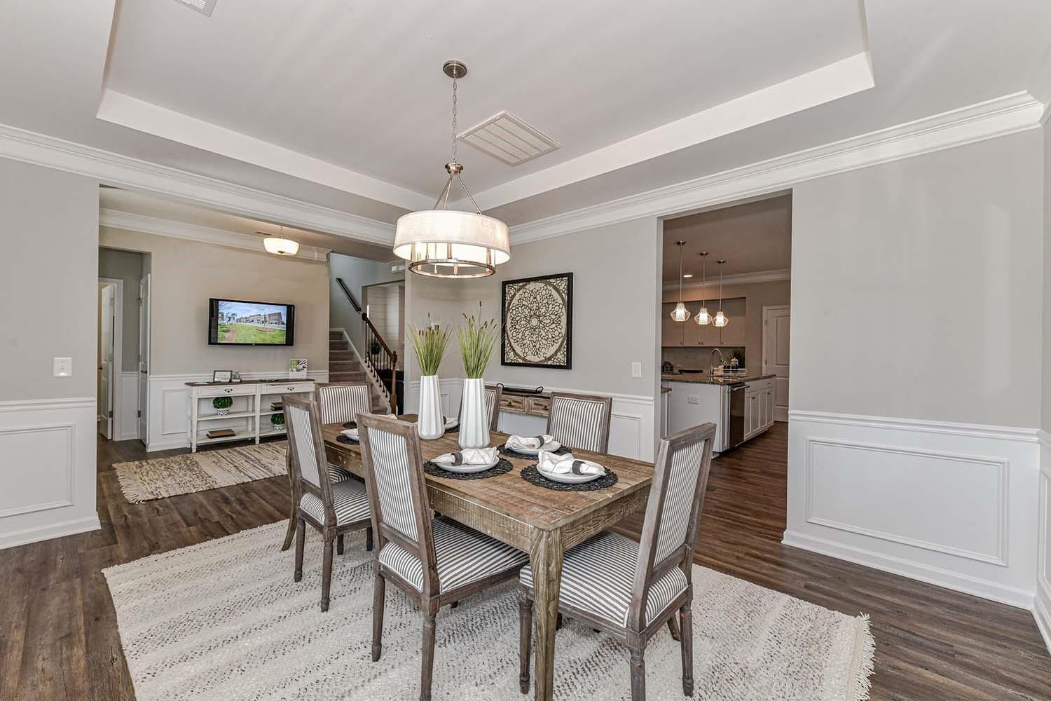277 Harrison Lane Locust, NC 28097 - Photo 4 of 25 a view of a dining room with furniture