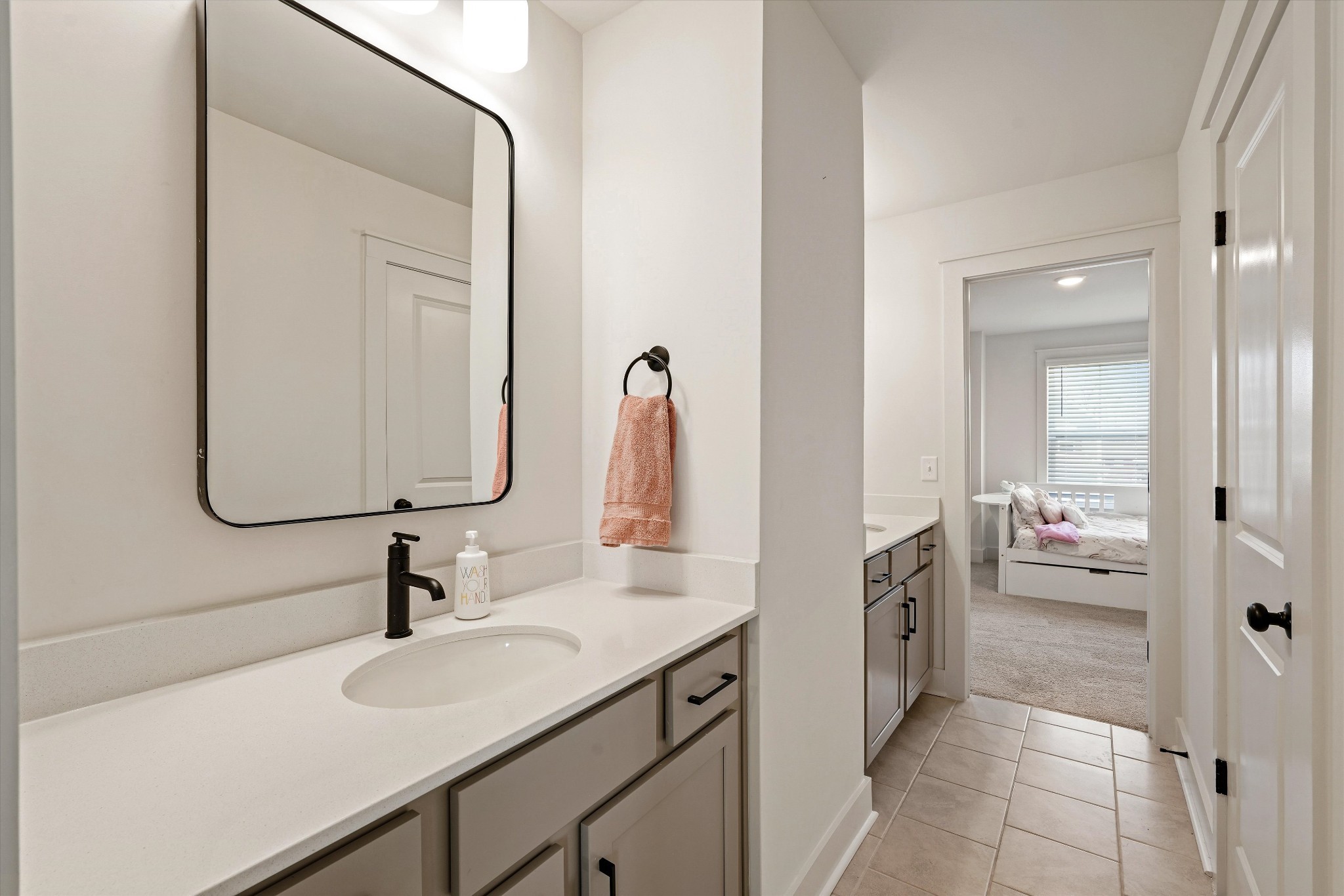 3729 Felipe Way Murfreesboro, TN 37129 - Photo 21 of 32 a bathroom with a sink and mirror