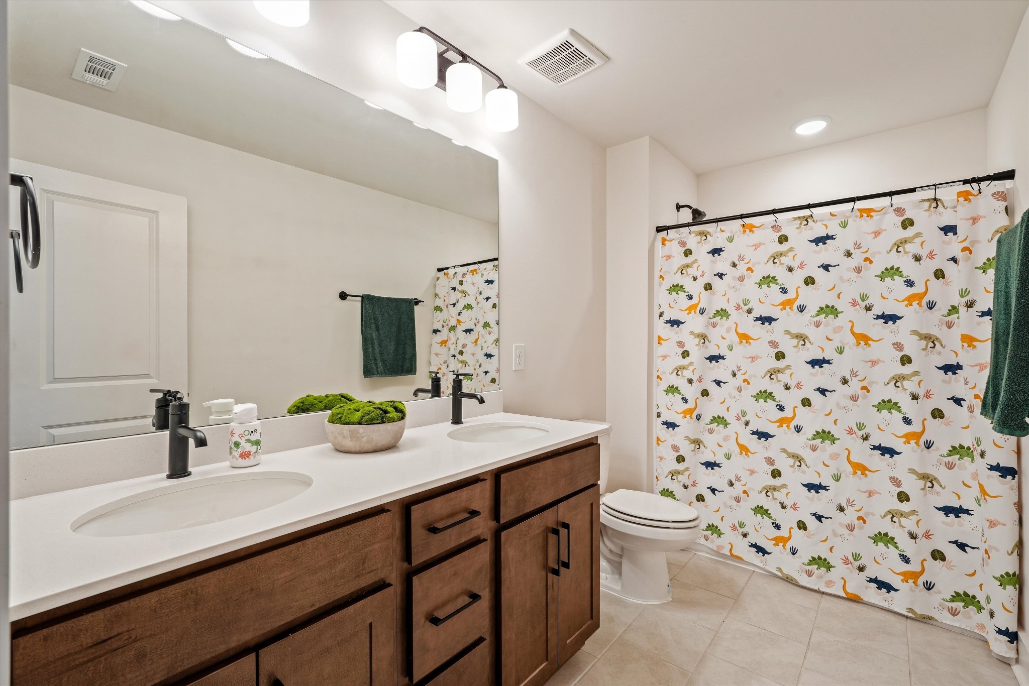 3729 Felipe Way Murfreesboro, TN 37129 - Photo 25 of 32 a bathroom with a sink a toilet and shower curtain
