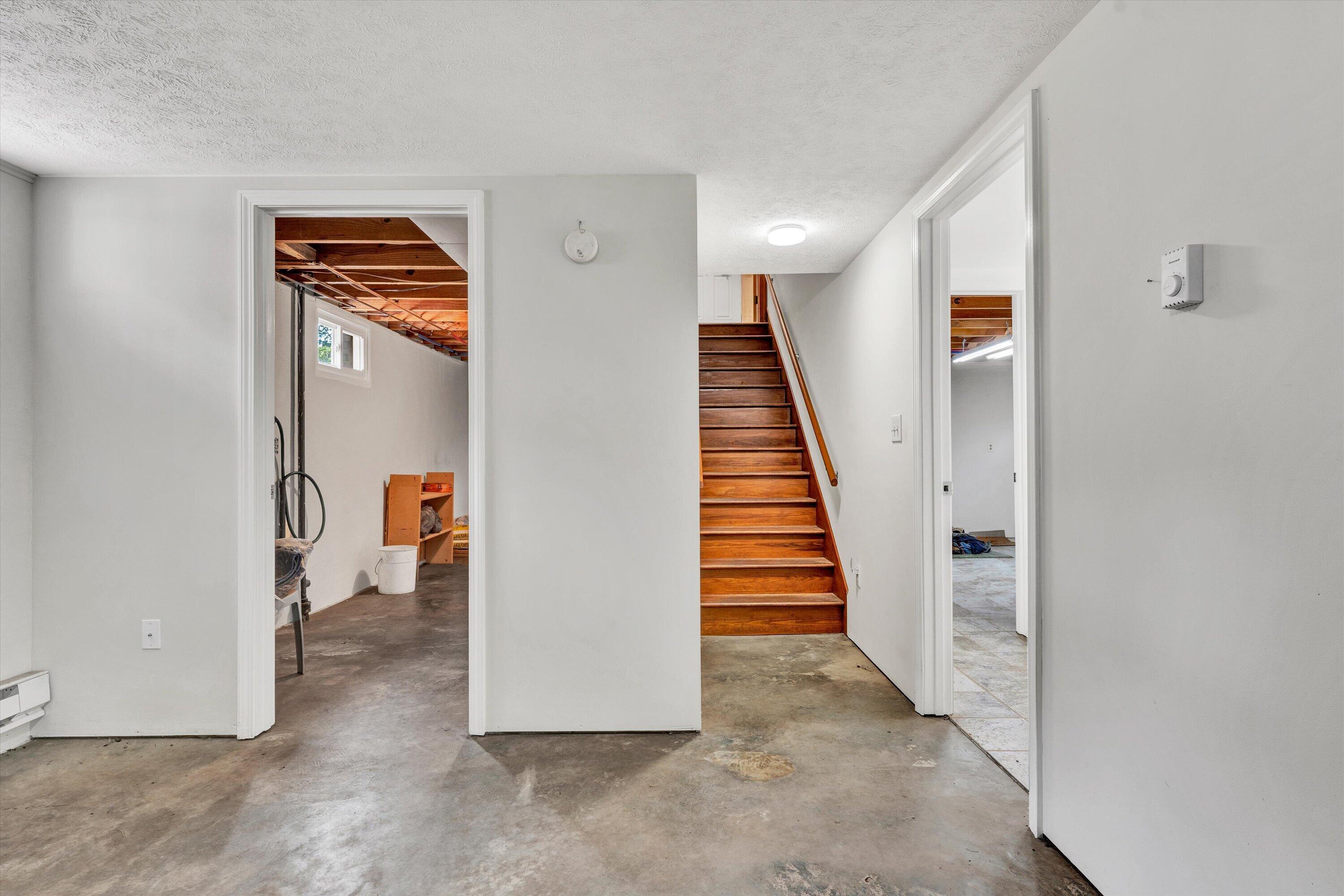 2296 Sandy Level Road Goodview, VA 24095 - Photo 23 of 48 a view of a hallway view with staircase
