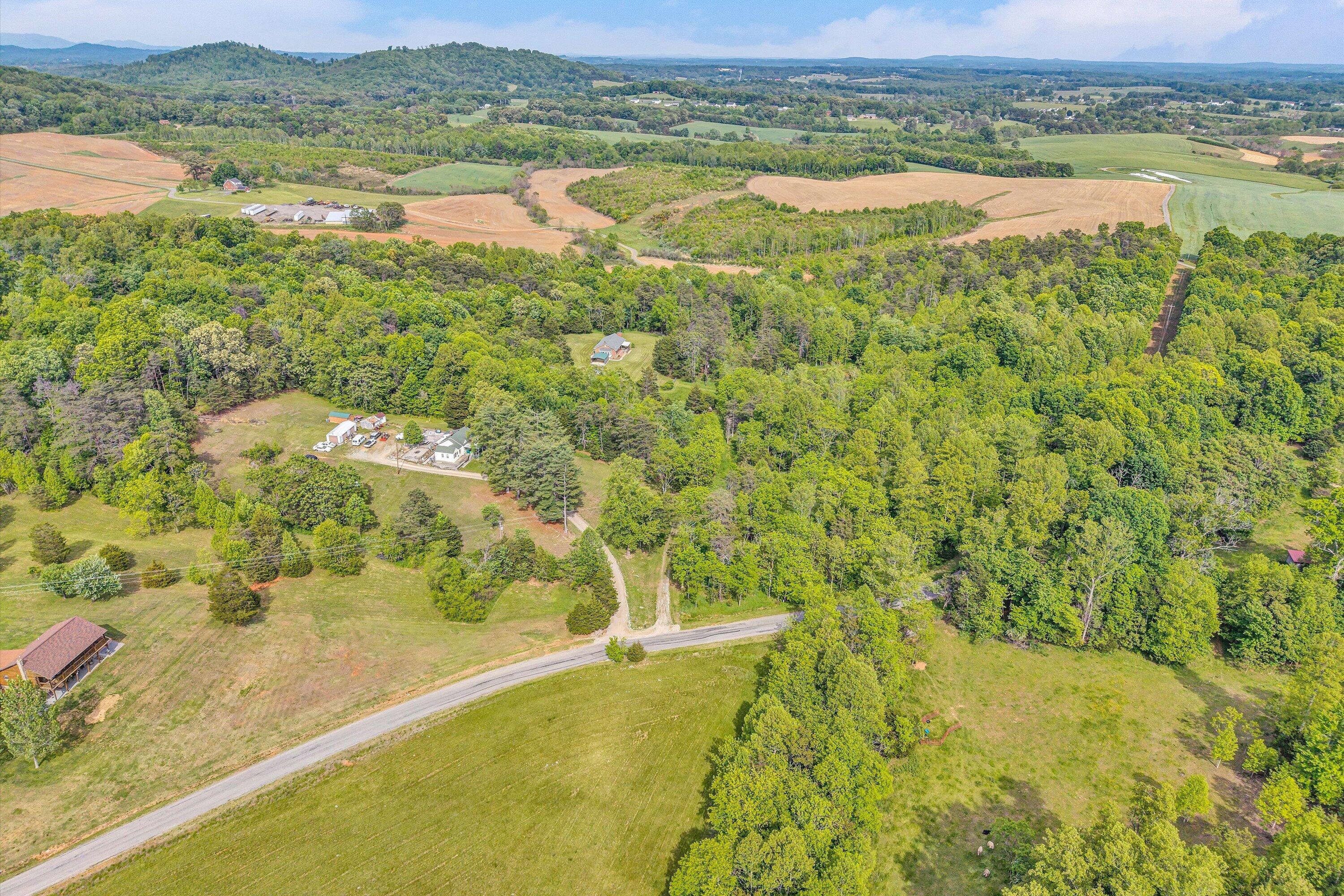 2296 Sandy Level Road Goodview, VA 24095 - Photo 29 of 48 a view of a lake from a yard