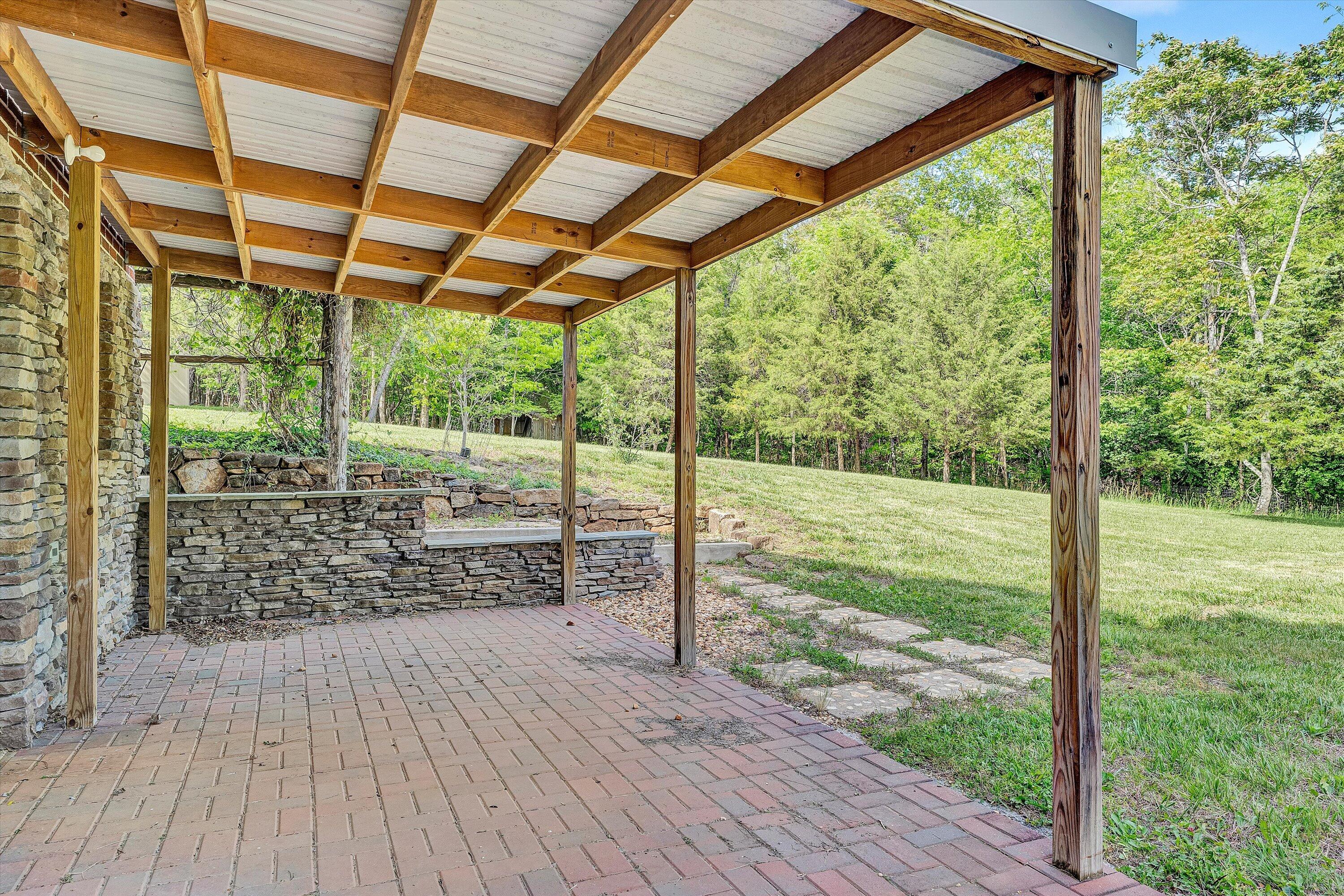 2296 Sandy Level Road Goodview, VA 24095 - Photo 35 of 48 a view of outdoor space with wooden floor and deck
