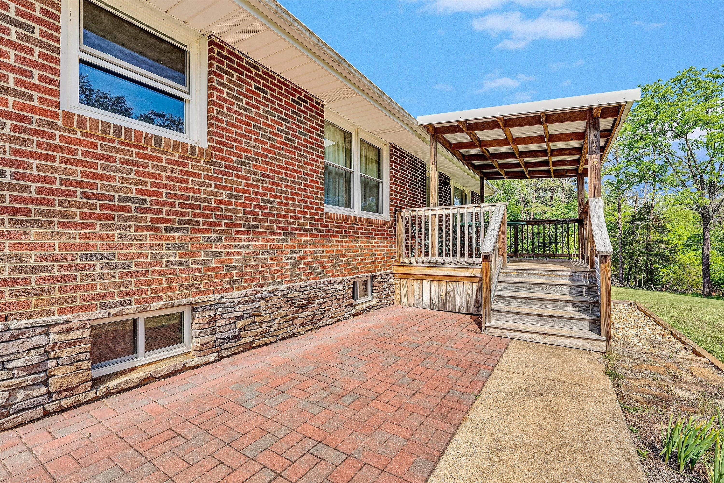 2296 Sandy Level Road Goodview, VA 24095 - Photo 8 of 48 a porch with seating space