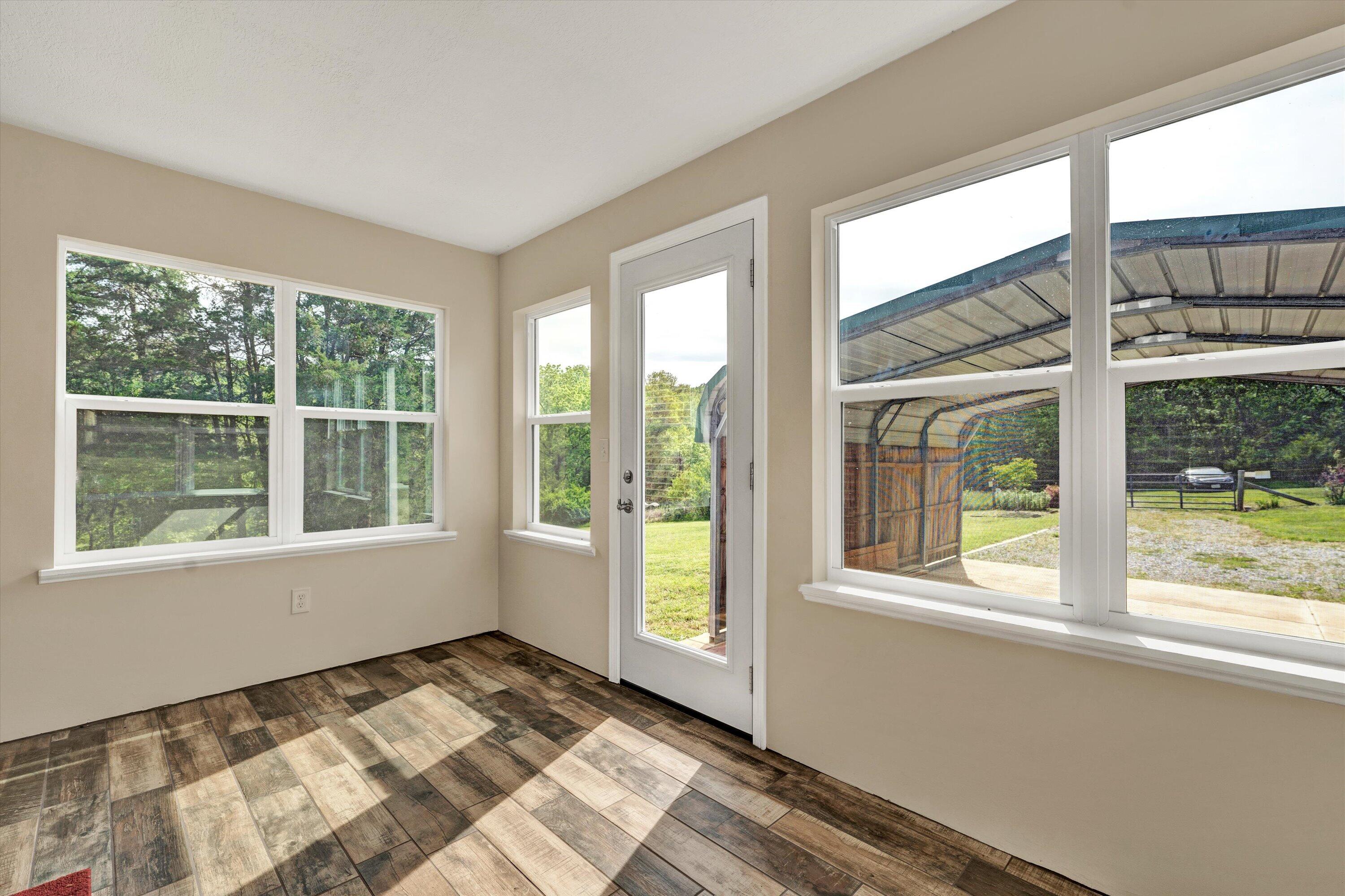 2296 Sandy Level Road Goodview, VA 24095 - Photo 10 of 48 a view of an empty room and a window