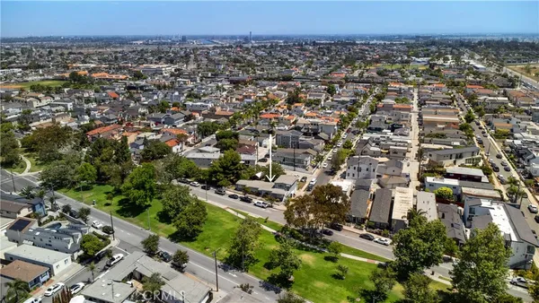 a view of a car parked in front of a house