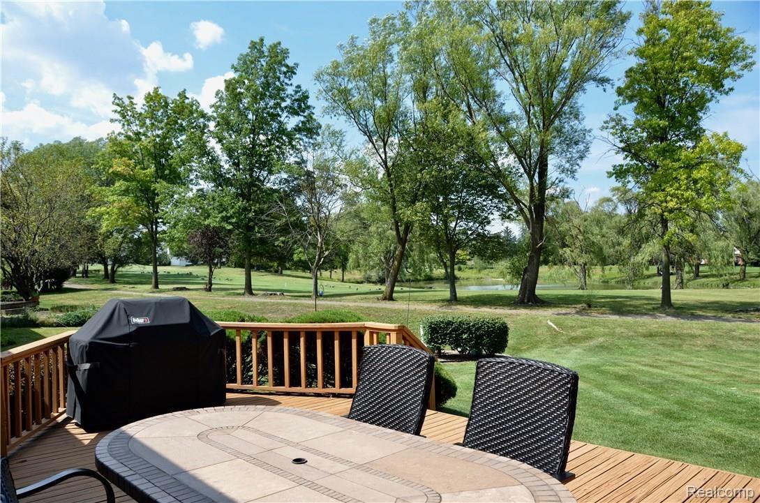 618 Baker Street Rochester, MI 48307 - Photo 22 of 25 Newer deck overlooking golf course
