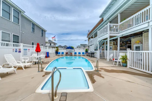 swimming pool with outdoor seating