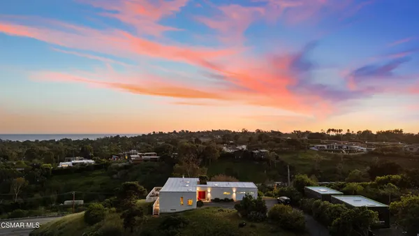 a aerial view of a house with a garden