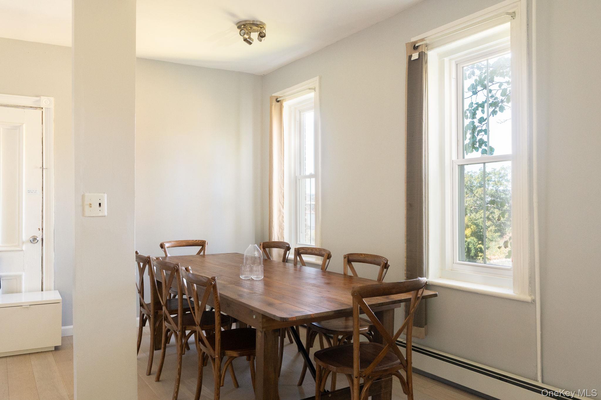12 Monell Place Beacon, NY 12508 - Photo 19 of 27 a view of a dining room with furniture and window