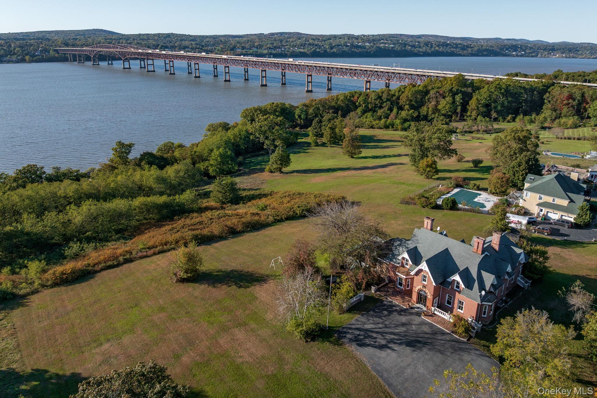 12 Monell Place Beacon, NY 12508 - Photo 27 of 27 an aerial view of a house with a yard and lake view