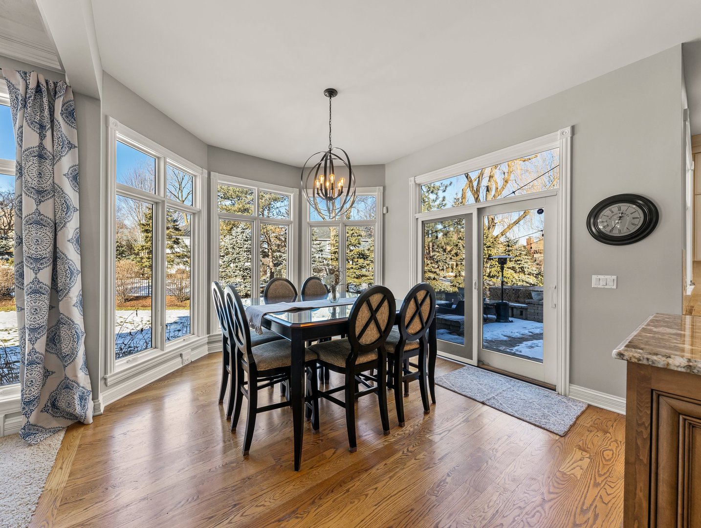 63 Mitchell Circle Wheaton, IL 60189 - Photo 16 of 54 a view of a dining room with furniture window and wooden floor