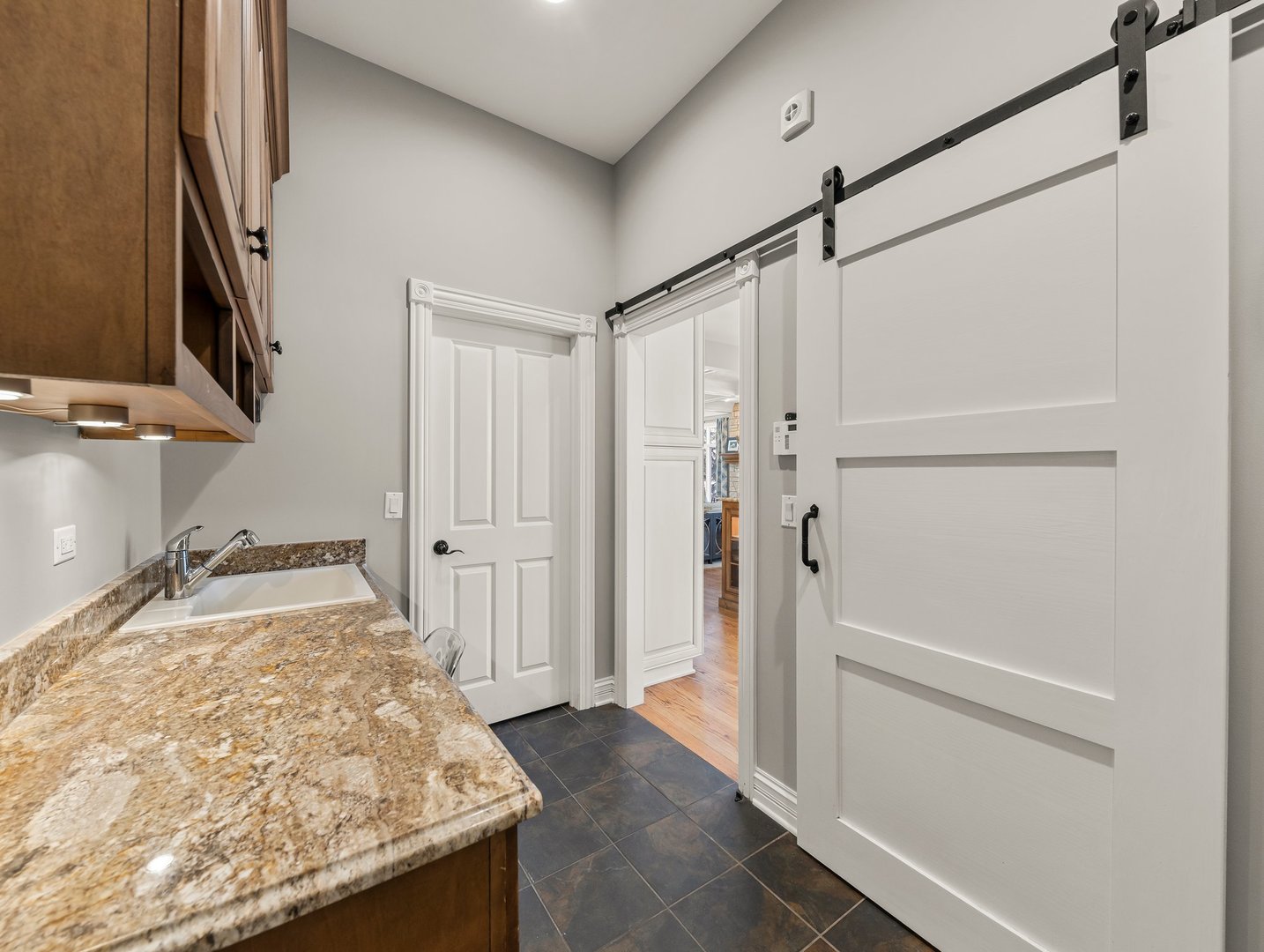 63 Mitchell Circle Wheaton, IL 60189 - Photo 19 of 54 a bathroom with a granite countertop sink and a mirror