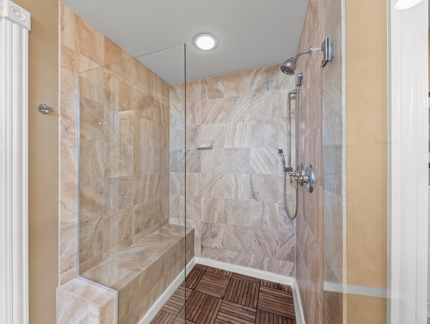 63 Mitchell Circle Wheaton, IL 60189 - Photo 28 of 54 a bathroom with a shower and a glass door