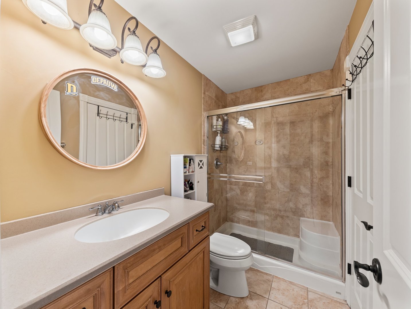 63 Mitchell Circle Wheaton, IL 60189 - Photo 35 of 54 a bathroom with a granite countertop sink mirror vanity and toilet