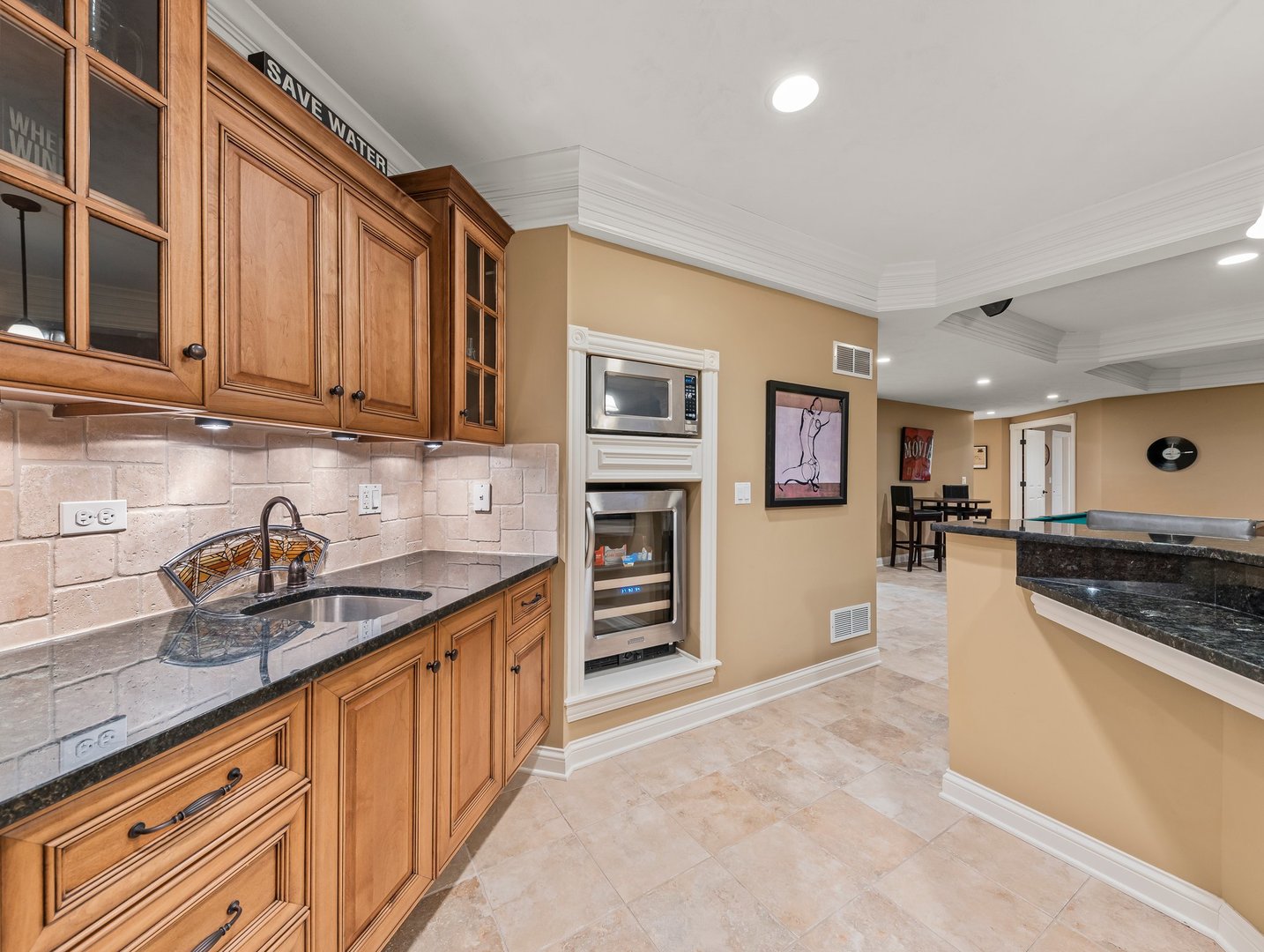 63 Mitchell Circle Wheaton, IL 60189 - Photo 39 of 54 a kitchen with stainless steel appliances granite countertop a sink and cabinets