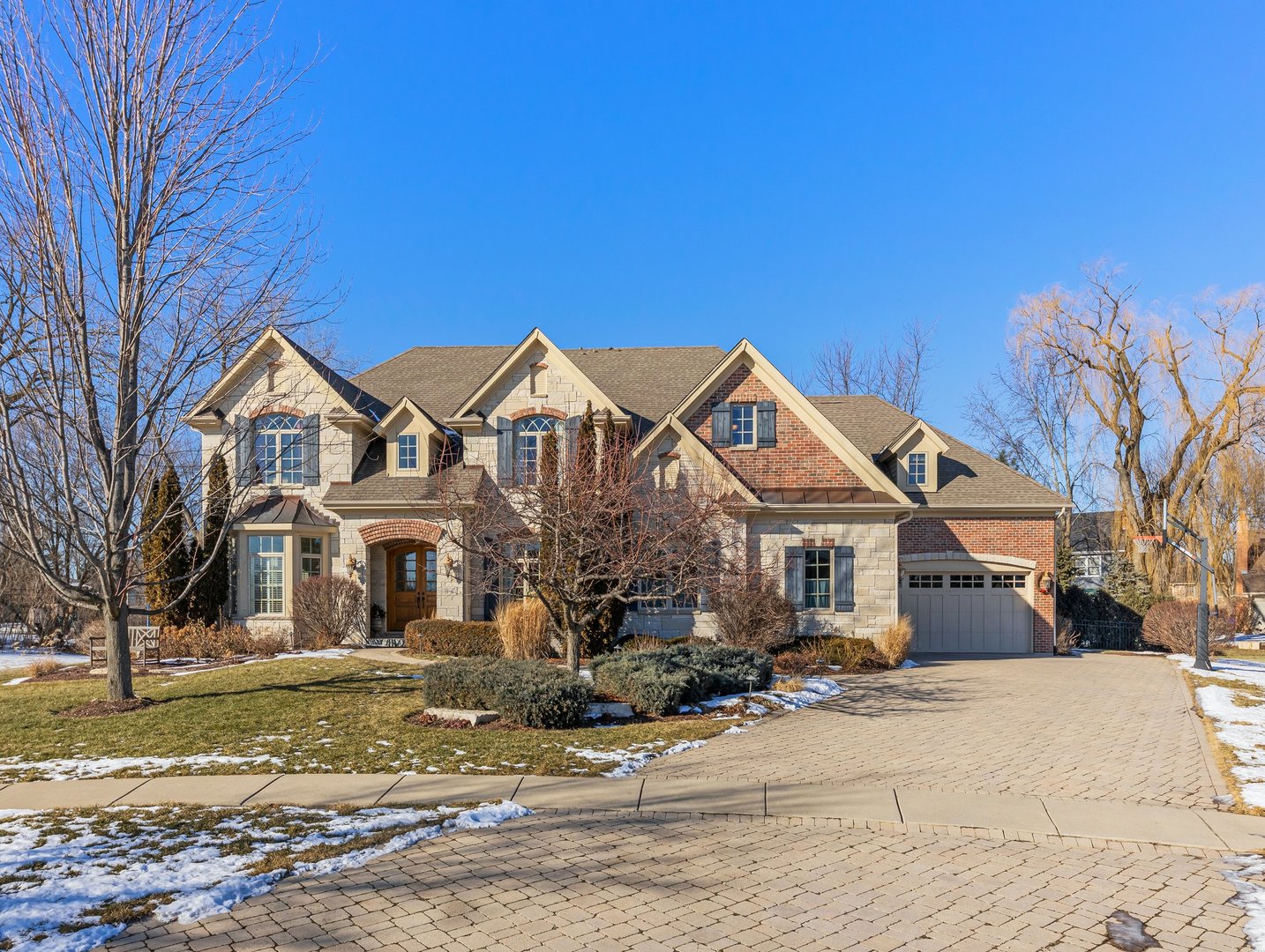 63 Mitchell Circle Wheaton, IL 60189 - Photo 53 of 54 a front view of a house with a yard