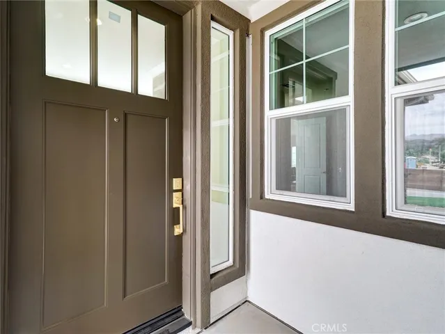 a view of a hallway with entryway