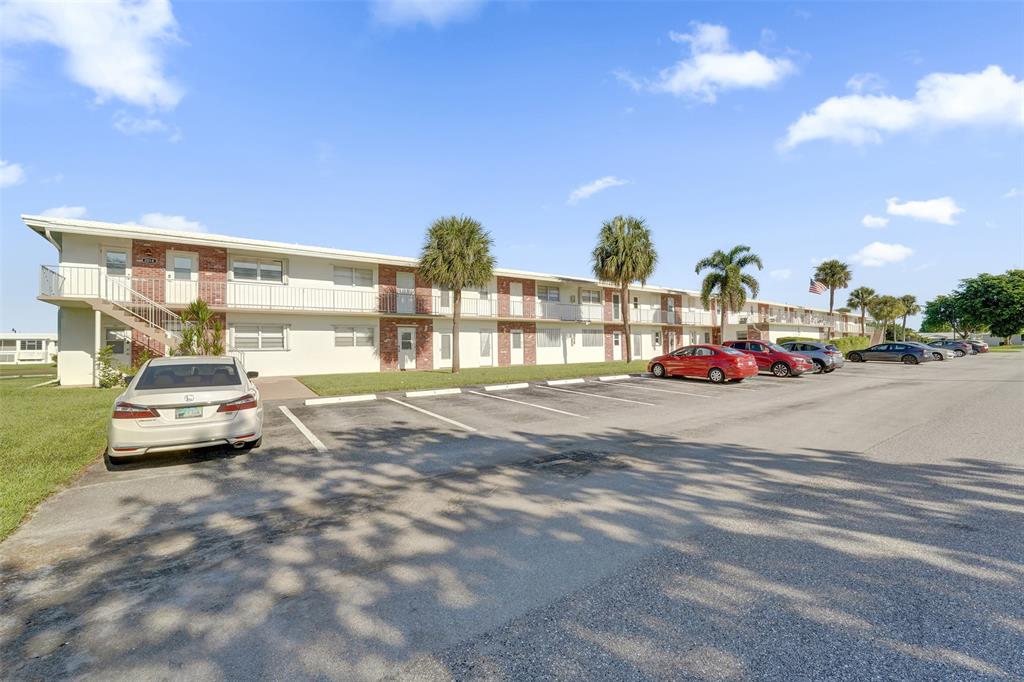 2751 East Golf Boulevard, Unit 2019 Pompano Beach, FL 33064 - Photo 2 of 68 a view of street with parked cars