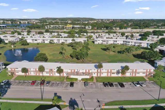 a view of swimming pool with outdoor seating