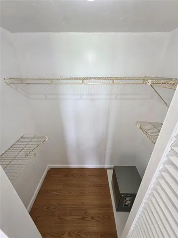 a view of a room with racks on the wall
