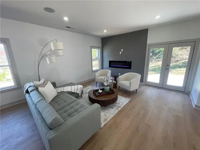 a living room with furniture and window