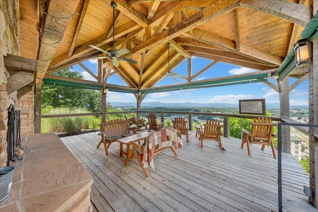 swimming pool view with a seating space