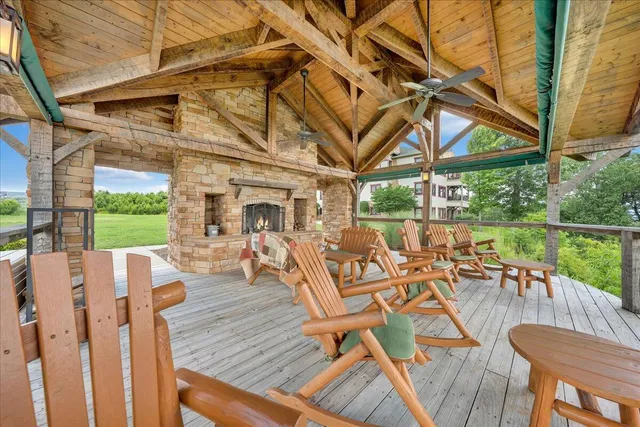a view of a dining room with furniture and a rug
