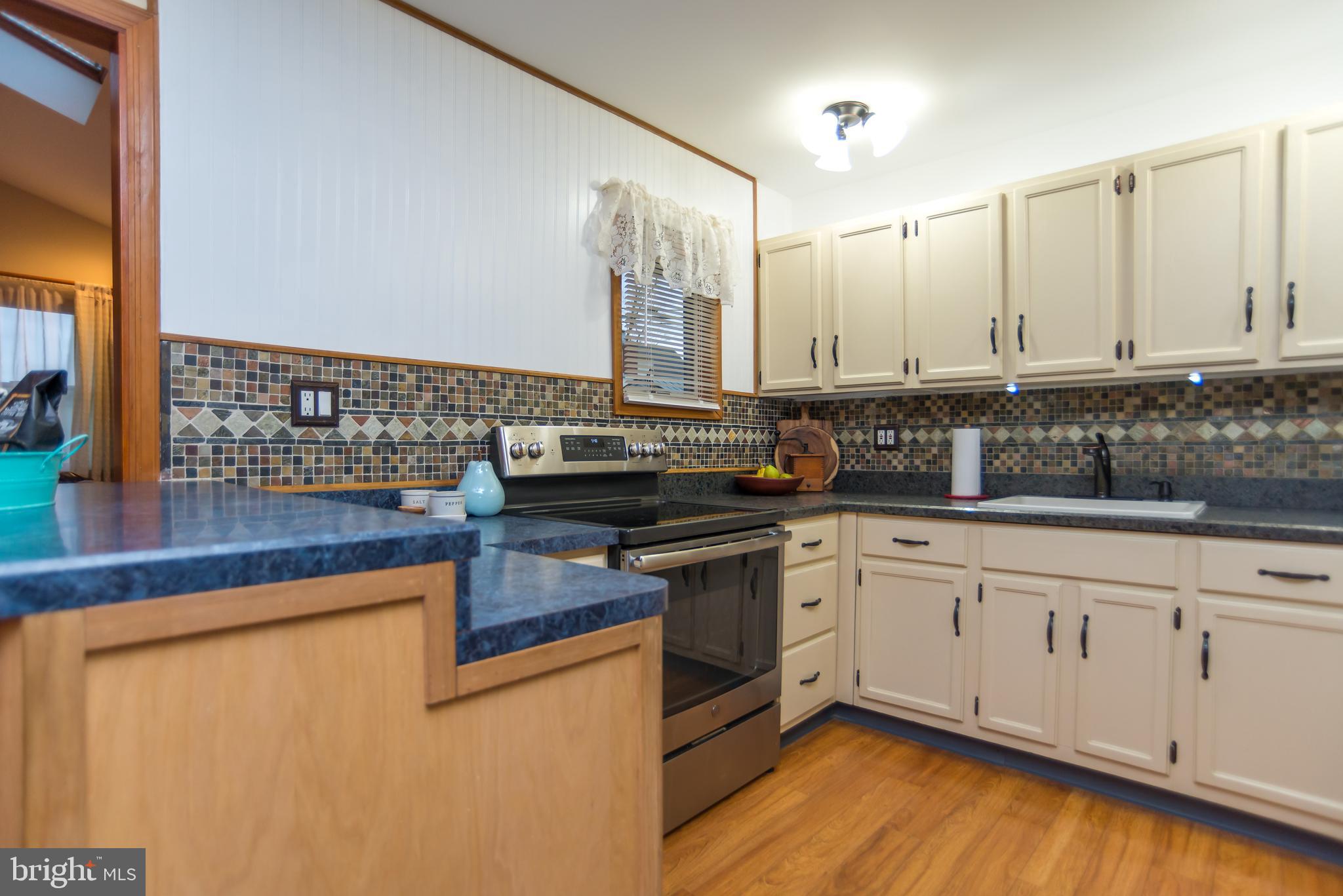 57 Handy Road Levittown, PA 19056 - Photo 7 of 23 Kitchen with view of yard