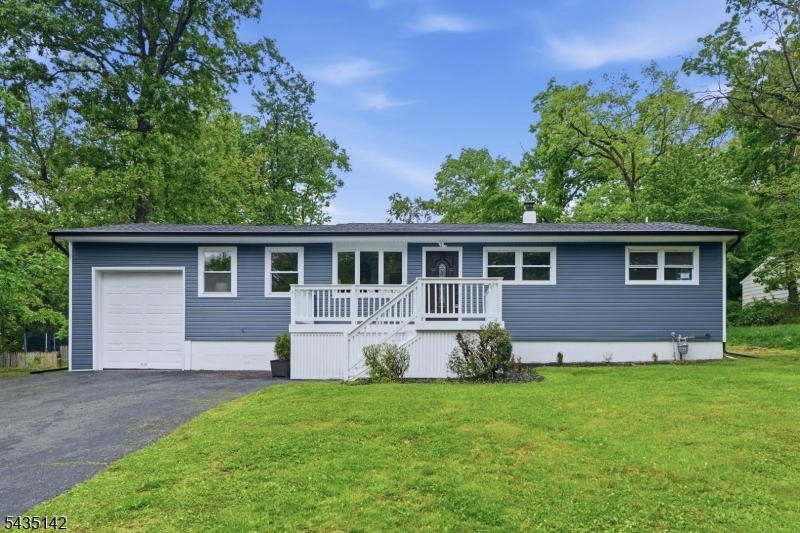 36 Ruth Street Hopatcong, NJ 07874 - Photo 1 of 25 a front view of a house with a yard