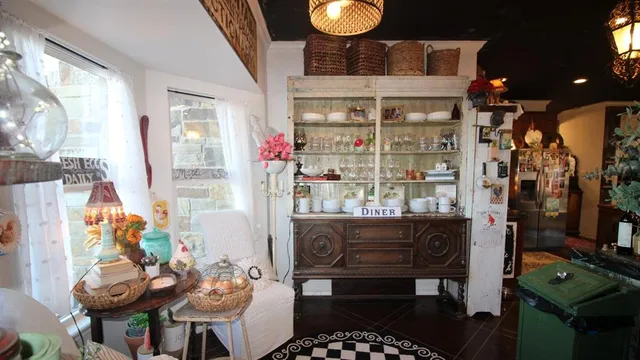 a outdoor dining space with furniture and outdoor view
