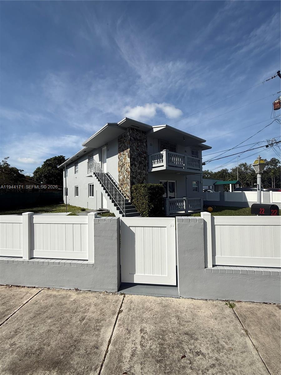 22 Southwest 55th Avenue Road, Unit U Miami, FL 33134 - Photo 2 of 6 a view of a building with entryway