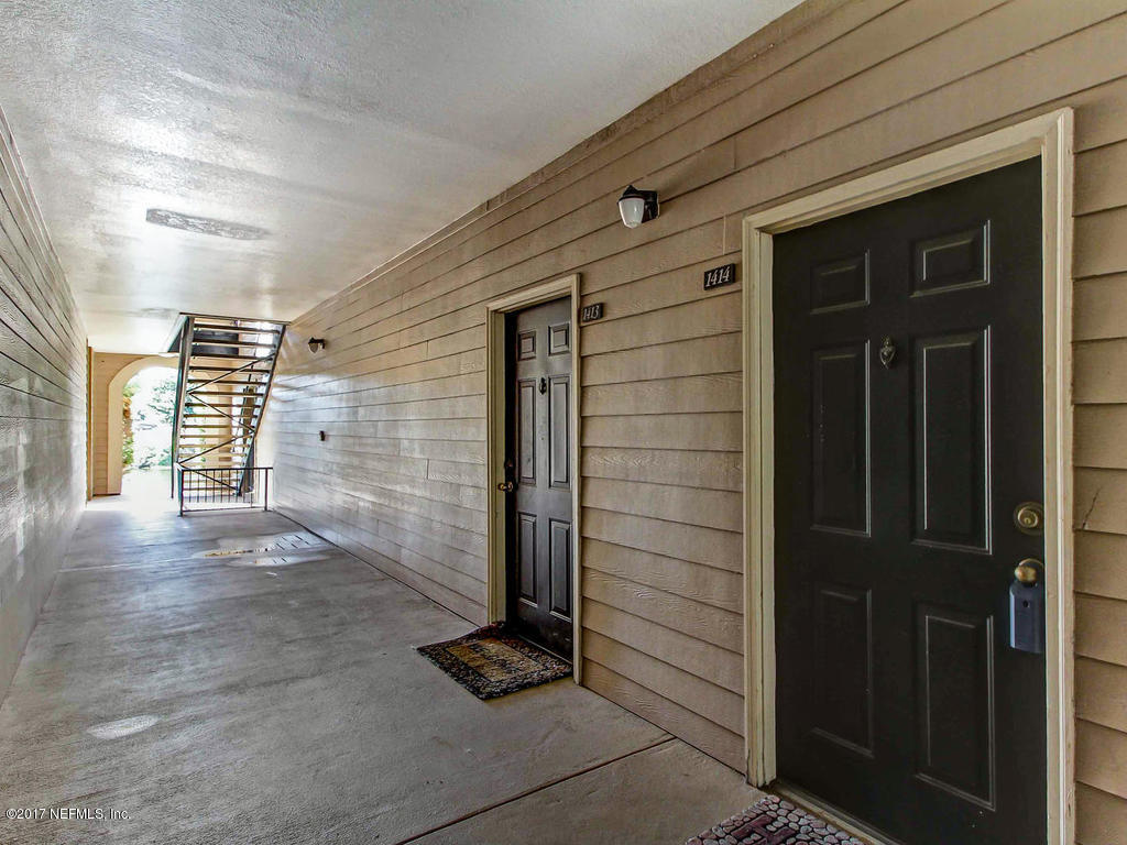 10961 Burnt Mill Road, Unit 1414 Jacksonville, FL 32256 - Photo 2 of 39 a view of an entryway door
