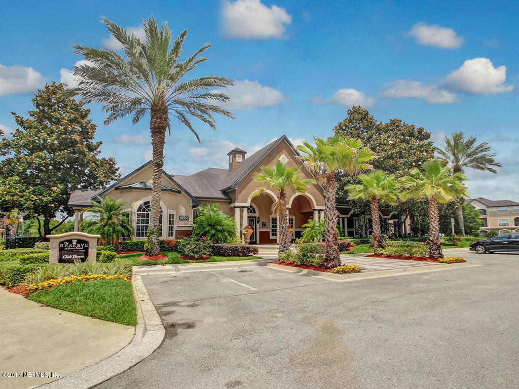 10961 Burnt Mill Road, Unit 1414 Jacksonville, FL 32256 - Photo 30 of 39 a childrens park with lots of palm trees