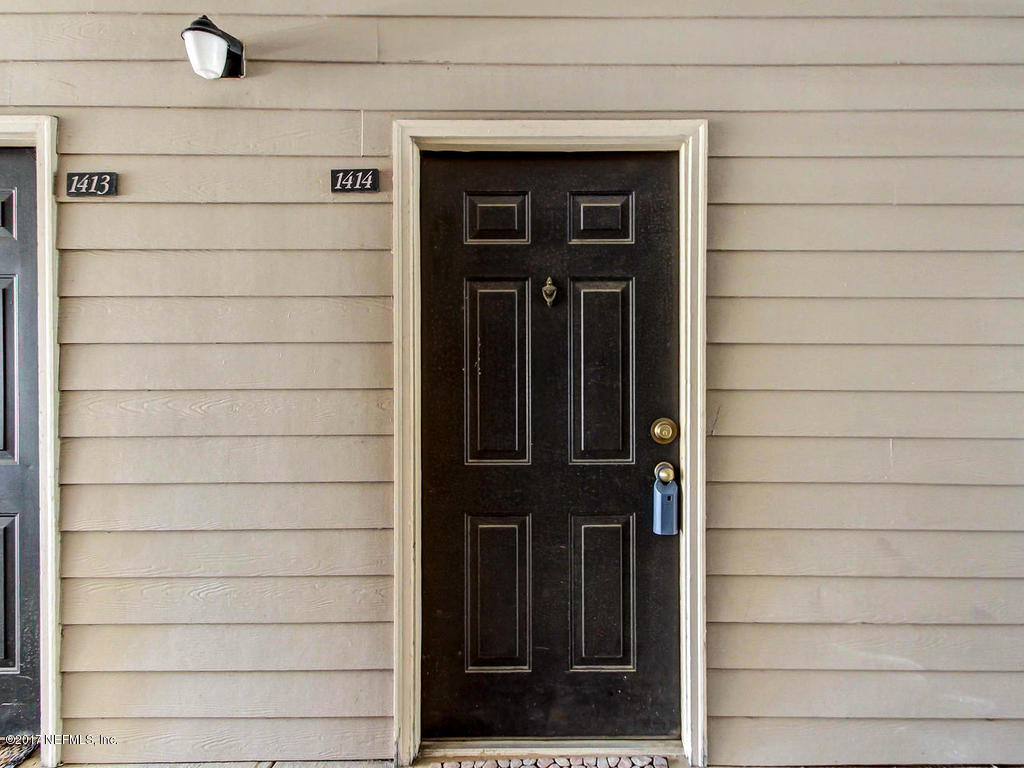 10961 Burnt Mill Road, Unit 1414 Jacksonville, FL 32256 - Photo 3 of 39 a view of front door